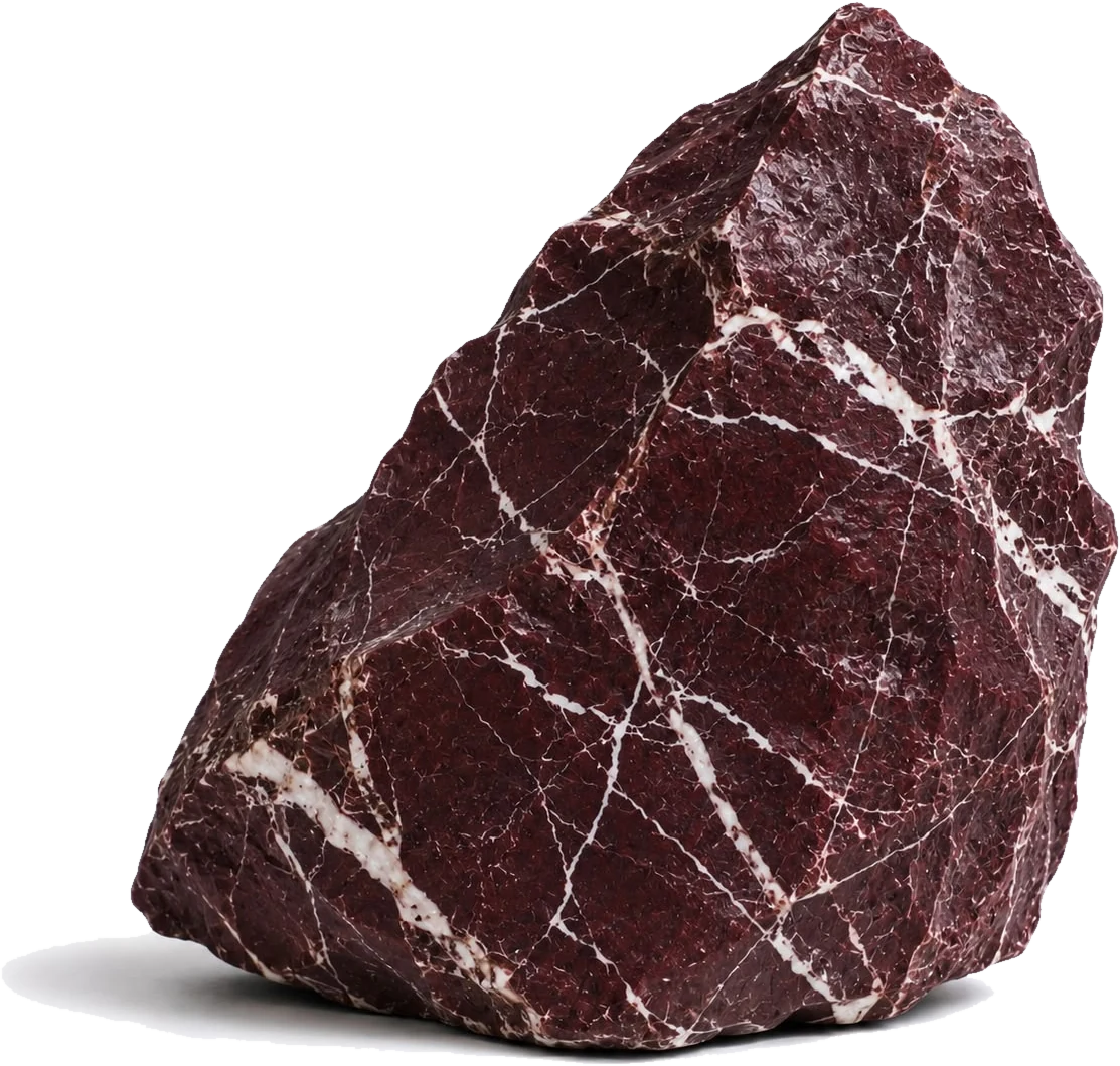 Red Makrana marble block showing its burgundy ground and white veining